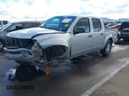 ✅ 2005 Nissan Frontier LE • VIN: 1N6AD07U05C463681 • Lot: 43757506. Listed on IAAI with 184,377 mi. Free auction sales archive from the USA and detailed vehicle history report at DreamBid. Image 2.