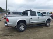 ✅ 2002 Dodge Dakota SLT • VIN: 1B7HG48N82S581583 • Lot: 41525790. Wystawiony na IAAI z przebiegiem 255 806 mil. Bezpłatny archiwum sprzedaży aukcyjnych z USA i szczegółowy raport historii pojazdu na DreamBid. Zdjęcie 13.