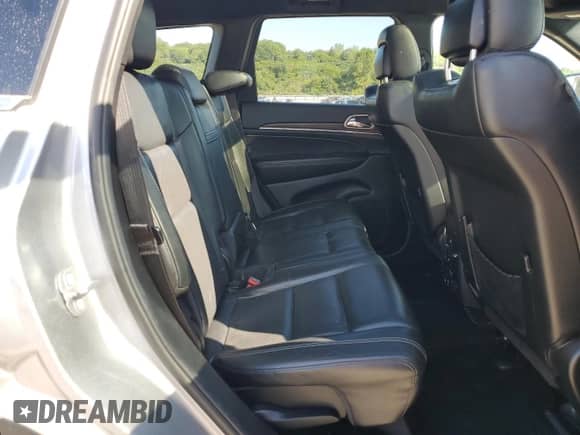 2014 Jeep Grand Cherokee Limited z VIN 1C4RJFBM9EC376886, wystawiony jako Copart lot #71503795 z przebiegiem 120 636 mil mil oraz Czysty tytuł • Clean title. Historia ofert i sprzedaży dostępna na DreamBid. Obrazek 11.