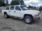 2001 Dodge Dakota Sport с VIN 1B7HG2AZ11S323342, выставлен на аукционе Copart как лот 59001405 с пробегом 245 225 миль миль и Списание • Salvage title. История ставок и продаж доступна на DreamBid. Изображение 4.