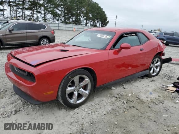 ✅ 2012 Dodge Challenger SXT Plus • VIN: 2C3CDYAG8CH131127 • Lot: 79948814. Wystawiony na Copart z przebiegiem 151 702 mil. Bezpłatny archiwum sprzedaży aukcyjnych z USA i szczegółowy raport historii pojazdu na DreamBid. Zdjęcie 1.