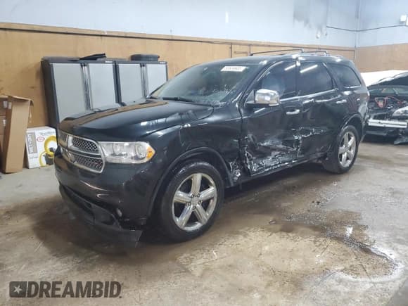 ✅ 2012 Dodge Durango Citadel • VIN: 1C4SDJET2CC337584 • Lot: 80634605. Listed on Copart with 170,819 mi. Free auction sales archive from the USA and detailed vehicle history report at DreamBid. Image 1.
