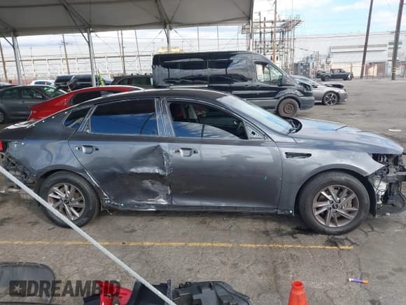 ✅ 2020 Kia Optima LX • VIN: 5XXGT4L31LG448253 • Lot: 43550559. Listed on IAAI with 59,595 mi. Free auction sales archive from the USA and detailed vehicle history report at DreamBid. Image 14.