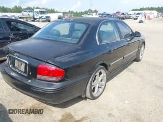 ✅ 2002 Hyundai Sonata GLS • VIN: KMHWF35HX2A557404 • Lot: 42869421. Listed on IAAI with 242,947 mi. Free auction sales archive from the USA and detailed vehicle history report at DreamBid. Image 4.