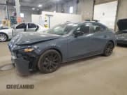 ✅ 2024 Mazda 3 S Carbon Edition • VIN: 3MZBPBCM8RM413399 • Лот: 85312995. Опубликован ранее на Copart с пробегом 9 844 миль. Бесплатный доступ к архиву аукционных продаж из США и подробный отчёт об истории автомобиля на DreamBid. Изображение 1.