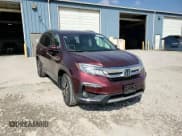 ✅ 2021 Honda Pilot Touring 8-Passenger • VIN: 5FNYF6H91MB002628 • Lot: 52885655. Listed on Copart with 41,537 mi. Free auction sales archive from the USA and detailed vehicle history report at DreamBid. Image 12.