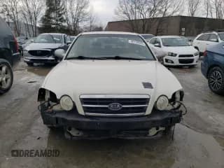 ✅ 2004 Kia Optima LX • VIN: KNAGD128445305177 • Лот: 46150285. Опубликован ранее на Copart с пробегом 128 279 миль. Бесплатный доступ к архиву аукционных продаж из США и подробный отчёт об истории автомобиля на DreamBid. Изображение 5.