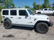 ✅ 2020 Jeep Wrangler Unlimited Sahara • VIN: 1C4HJXEN4LW330867 • Lot: 41790709. Listed on IAAI with 63,151 mi. Free auction sales archive from the USA and detailed vehicle history report at DreamBid. Image 13.