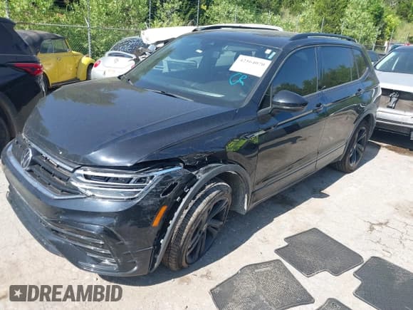 ✅ 2023 Volkswagen Tiguan SE R-Line Black • VIN: 3VVCB7AX3PM116622 • Лот: 42564070. Опубликован ранее на IAAI с пробегом 60 539 миль. Бесплатный доступ к архиву аукционных продаж из США и подробный отчёт об истории автомобиля на DreamBid. Изображение 2.