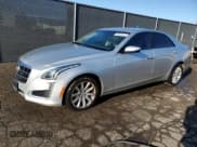 ✅ 2014 Cadillac CTS AWD • VIN: 1G6AW5SX7E0160428 • Lot: 89451515. Listed on Copart with 142,896 mi. Free auction sales archive from the USA and detailed vehicle history report at DreamBid. Image 1.