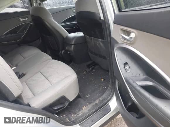 2017 Hyundai Santa Fe 2.4L z VIN 5XYZT3LB1HG437508, wystawiony jako IAAI lot #43278655 z przebiegiem 104 863 mil mil oraz . Historia ofert i sprzedaży dostępna na DreamBid. Obrazek 8.