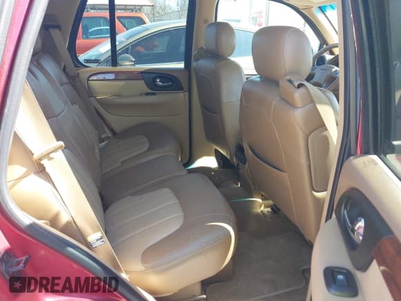 ✅ 2002 GMC Envoy SLT • VIN: 1GKDS13S922205147 • Lot: 42041118. Listed on IAAI with 127,400 mi. Free auction sales archive from the USA and detailed vehicle history report at DreamBid. Image 8.