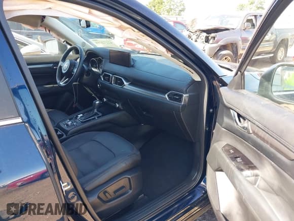 ✅ 2023 Mazda CX-5 S Carbon Edition • VIN: JM3KFBCM2P0250701 • Lot: 42272818. Listed on IAAI with 11,949 mi. Free auction sales archive from the USA and detailed vehicle history report at DreamBid. Image 5.