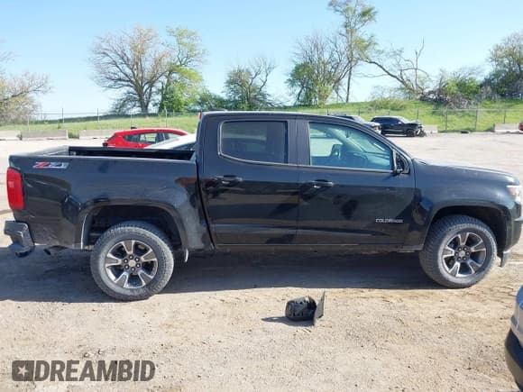 ✅ 2020 Chevrolet Colorado 4WD Z71 • VIN: 1GCGTDEN4L1229054 • Лот: 42194531. Опубликован ранее на IAAI с пробегом 85 066 миль. Бесплатный доступ к архиву аукционных продаж из США и подробный отчёт об истории автомобиля на DreamBid. Изображение 13.