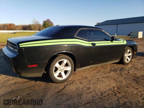 ✅ 2012 Dodge Challenger SXT • VIN: 2C3CDYAG4CH106595 • Лот: 90971245. Опубликован ранее на Copart с пробегом 97 778 миль. Бесплатный доступ к архиву аукционных продаж из США и подробный отчёт об истории автомобиля на DreamBid. Изображение 3.