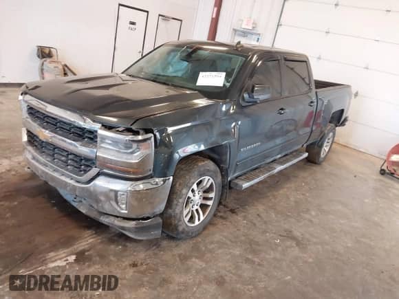 2018 Chevrolet Silverado 1500 LT z VIN 3GCUKREC0JG519095, wystawiony jako IAAI lot #43271594 z przebiegiem 108 548 mil mil oraz . Historia ofert i sprzedaży dostępna na DreamBid. Obrazek 2.