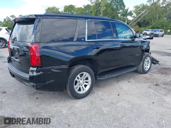✅ 2020 Chevrolet Tahoe LT • VIN: 1GNSKBKC8LR157630 • Lot: 43609359. Listed on IAAI with 158,783 mi. Free auction sales archive from the USA and detailed vehicle history report at DreamBid. Image 4.