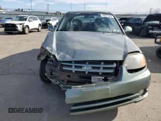 2003 Hyundai Accent GL with VIN KMHCG35CX3U242820, listed as a Copart auction lot 45971325 with 132,192 mi miles and Salvage title. Bid and sale history available at DreamBid. Image 5.