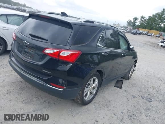 ✅ 2021 Chevrolet Equinox Premier • VIN: 2GNAXNEV5M6156265 • Лот: 42801809. Опубликован ранее на IAAI с пробегом 108 726 миль. Бесплатный доступ к архиву аукционных продаж из США и подробный отчёт об истории автомобиля на DreamBid. Изображение 4.