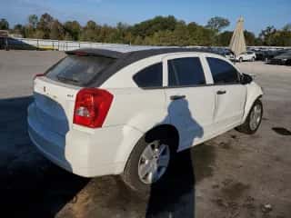 2007 Dodge Caliber SXT с VIN 1B3HB48B57D349184, выставлен на аукционе Copart как лот 78461414 с пробегом 205 995 миль миль и Списание • Salvage title. История ставок и продаж доступна на DreamBid. Изображение 3.