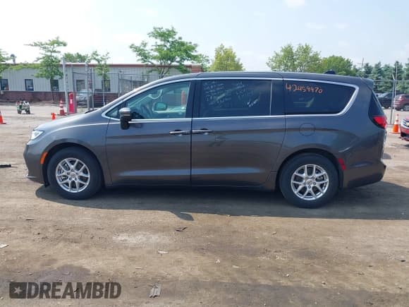 ✅ 2023 Chrysler Pacifica Touring L • VIN: 2C4RC1BG7PR581107 • Lot: 42459970. Listed on IAAI with 56,275 mi. Free auction sales archive from the USA and detailed vehicle history report at DreamBid. Image 14.
