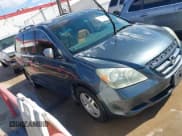 ✅ 2005 Honda Odyssey EX-L • VIN: 5FNRL38635B104368 • Lot: 43379924. Listed on IAAI with 176,473 mi. Free auction sales archive from the USA and detailed vehicle history report at DreamBid. Image 1.