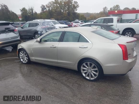 ✅ 2015 Cadillac ATS Luxury AWD • VIN: 1G6AH5RX4F0122009 • Lot: 43563685. Wystawiony na IAAI z przebiegiem 31 304 mil. Bezpłatny archiwum sprzedaży aukcyjnych z USA i szczegółowy raport historii pojazdu na DreamBid. Zdjęcie 14.