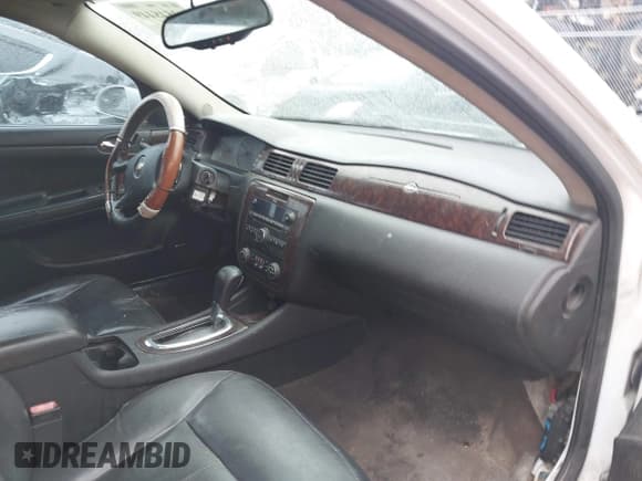 ✅ 2014 Chevrolet Impala LTZ • VIN: 2G1WC5E33E1167345 • Lot: 43548449. Listed on IAAI with 222,330 mi. Free auction sales archive from the USA and detailed vehicle history report at DreamBid. Image 5.