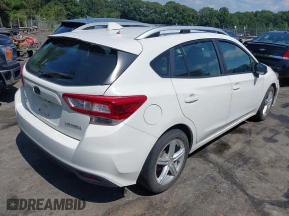 ✅ 2018 Subaru Impreza Premium • VIN: 4S3GTAD65J3728925 • Lot: 42812264. Listed on IAAI with 118,381 mi. Free auction sales archive from the USA and detailed vehicle history report at DreamBid. Image 4.