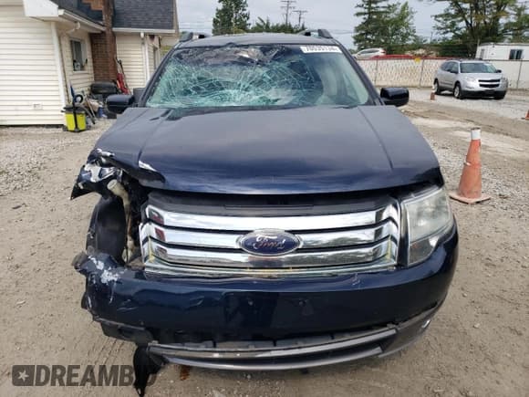 ✅ 2008 Ford Taurus X SEL • VIN: 1FMDK02W88GA44341 • Lot: 70535134. Wystawiony na Copart z przebiegiem 202 856 mil. Bezpłatny archiwum sprzedaży aukcyjnych z USA i szczegółowy raport historii pojazdu na DreamBid. Zdjęcie 5.