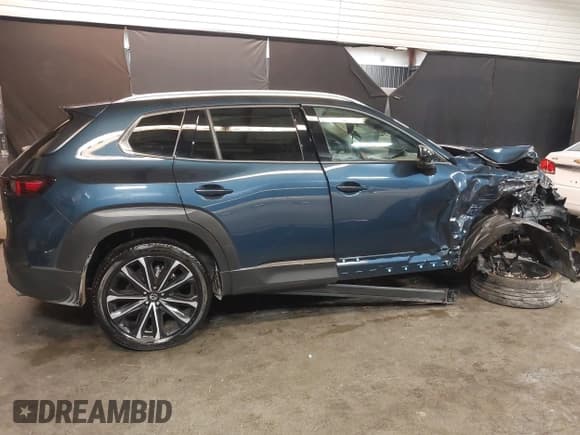 ✅ 2024 Mazda CX-50 S Premium Plus • VIN: 7MMVABEM0RN172166 • Lot: 41282676. Listed on IAAI with 8,180 mi. Free auction sales archive from the USA and detailed vehicle history report at DreamBid. Image 14.