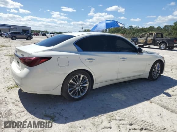 ✅ 2020 Infiniti Q50 Luxe • VIN: JN1EV7AP0LM205023 • Lot: 82580325. Listed on Copart with 96,883 mi. Free auction sales archive from the USA and detailed vehicle history report at DreamBid. Image 3.