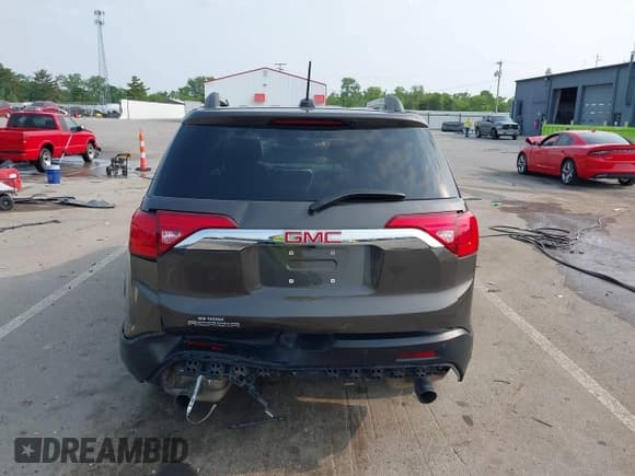 ✅ 2019 GMC Acadia SLE • VIN: 1GKKNLLS4KZ217451 • Lot: 42400144. Listed on IAAI with 67,911 mi. Free auction sales archive from the USA and detailed vehicle history report at DreamBid. Image 16.