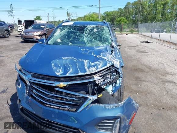 2024 Chevrolet Equinox Premier with VIN 3GNAXNEGXRL340850, listed as a IAAI auction lot 42049045 with 13,969 mi miles and . Bid and sale history available at DreamBid. Image 6.