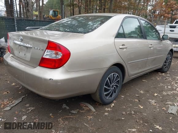 ✅ 2003 Toyota Camry XLE • VIN: 4T1BE30K83U250799 • Lot: 43758422. Listed on IAAI with 108,562 mi. Free auction sales archive from the USA and detailed vehicle history report at DreamBid. Image 4.