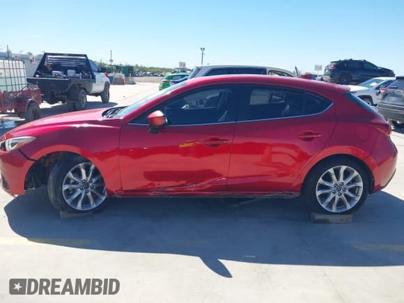 ✅ 2015 Mazda 3 S Grand Touring • VIN: JM1BM1M3XF1270671 • Лот: 43552704. Опубликован ранее на IAAI с пробегом 124 055 миль. Бесплатный доступ к архиву аукционных продаж из США и подробный отчёт об истории автомобиля на DreamBid. Изображение 14.