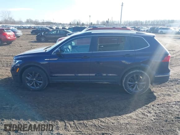 ✅ 2023 Volkswagen Tiguan SE • VIN: 3VVNB7AX3PM040666 • Lot: 41771816. Listed on IAAI with 28,832 mi. Free auction sales archive from the USA and detailed vehicle history report at DreamBid. Image 14.