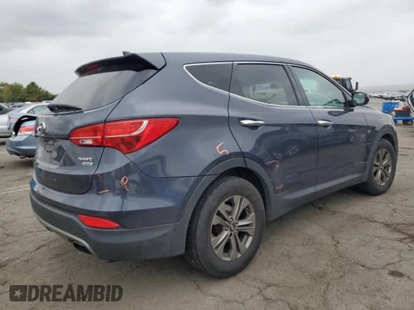 ✅ 2015 Hyundai Santa Fe • VIN: 5XYZTDLB0FG279875 • Лот: 72676104. Опубликован ранее на Copart с пробегом 158 418 миль. Бесплатный доступ к архиву аукционных продаж из США и подробный отчёт об истории автомобиля на DreamBid. Изображение 3.