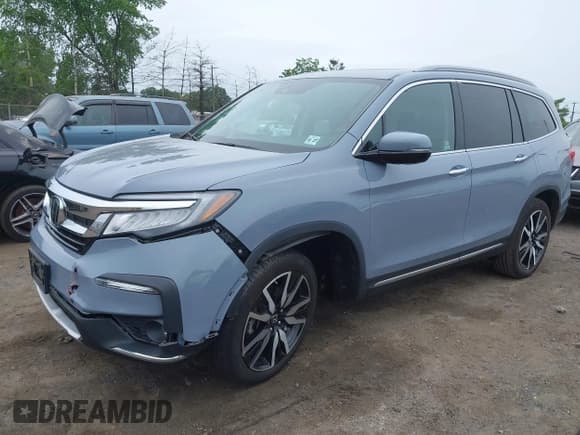 ✅ 2022 Honda Pilot Touring 7-Passenger • VIN: 5FNYF6H68NB056077 • Lot: 42357338. Listed on IAAI with 18,193 mi. Free auction sales archive from the USA and detailed vehicle history report at DreamBid. Image 17.