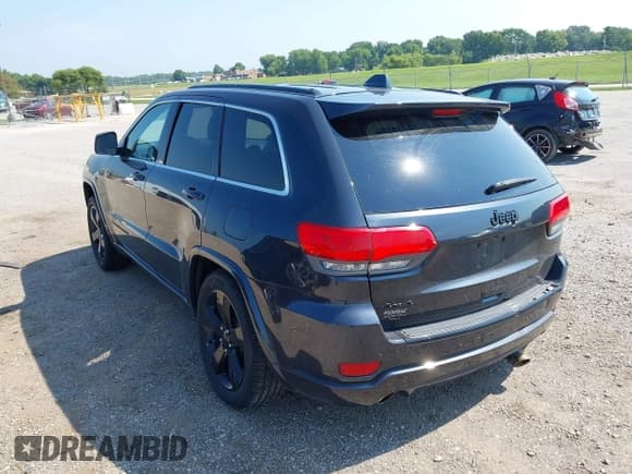 ✅ 2015 Jeep Grand Cherokee Altitude • VIN: 1C4RJFAG5FC704639 • Lot: 43003791. Listed on IAAI with 169,320 mi. Free auction sales archive from the USA and detailed vehicle history report at DreamBid. Image 3.