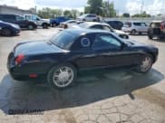 ✅ 2002 Ford Thunderbird Hardtop Premium • VIN: 1FAHP60A12Y104789 • Lot: 70710474. Wystawiony na Copart z przebiegiem 71 580 mil. Bezpłatny archiwum sprzedaży aukcyjnych z USA i szczegółowy raport historii pojazdu na DreamBid. Zdjęcie 3.