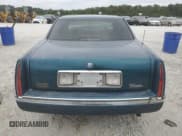 ✅ 1994 Cadillac DeVille • VIN: 1G6KD52B7RU282512 • Lot: 71072114. Listed on Copart with 179,919 mi. Free auction sales archive from the USA and detailed vehicle history report at DreamBid. Image 6.