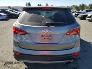 ✅ 2016 Hyundai Santa Fe • VIN: 5XYZTDLB9GG358950 • Лот: 61245063. Опубликован ранее на Copart с пробегом Не указан. Бесплатный доступ к архиву аукционных продаж из США и подробный отчёт об истории автомобиля на DreamBid. Изображение 6.