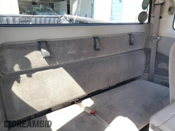 2002 Dodge Dakota Sport z VIN 1B7GL32XX2S588725, wystawiony jako Copart lot #65541345 z przebiegiem 205 568 mil mil oraz Szkoda całkowita • Salvage title. Historia ofert i sprzedaży dostępna na DreamBid. Obrazek 10.