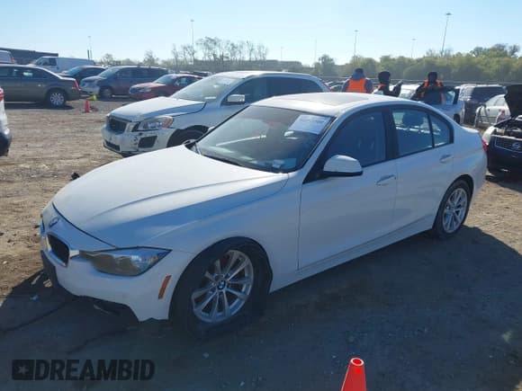 ✅ 2016 BMW 3 Series 320i xDrive • VIN: WBA8E5G51GNU21867 • Lot: 40593300. Listed on IAAI with 99,044 mi. Free auction sales archive from the USA and detailed vehicle history report at DreamBid. Image 17.