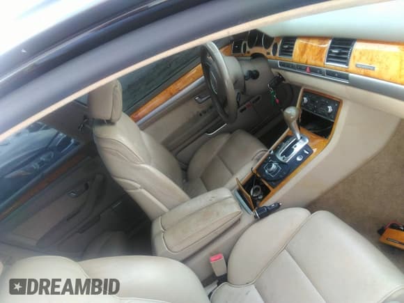 ✅ 2009 Audi A8 • VIN: WAULV94E29N005772 • Лот: 42266720. Опубликован ранее на IAAI с пробегом 102 014 миль. Бесплатный доступ к архиву аукционных продаж из США и подробный отчёт об истории автомобиля на DreamBid. Изображение 5.
