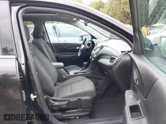 2018 Chevrolet Equinox LT z VIN 2GNAXJEV0J6142715, wystawiony jako IAAI lot #43262312 z przebiegiem 57 864 mil mil oraz . Historia ofert i sprzedaży dostępna na DreamBid. Obrazek 5.