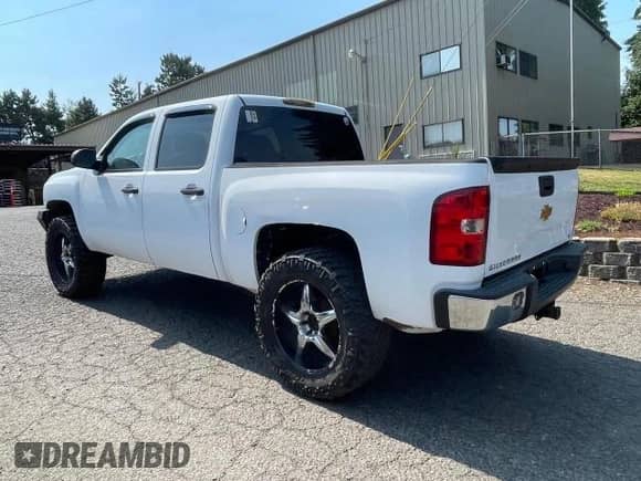 2013 Chevrolet Silverado 1500 LT z VIN 3GCPKSE71DG102953, wystawiony jako Copart lot #76147354 z przebiegiem 169 616 mil mil oraz Czysty tytuł • Clean title. Historia ofert i sprzedaży dostępna na DreamBid. Obrazek 3.