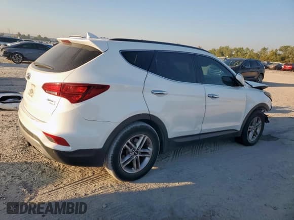 ✅ 2017 Hyundai Santa Fe 2.4L • VIN: 5XYZUDLB0HG400694 • Lot: 86504635. Listed on Copart with 174,876 mi. Free auction sales archive from the USA and detailed vehicle history report at DreamBid. Image 3.