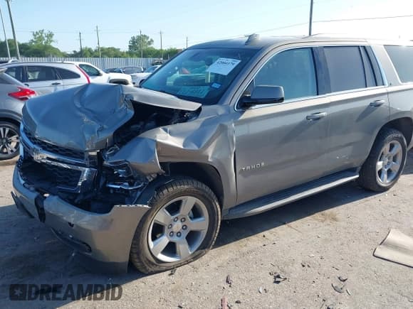 ✅ 2019 Chevrolet Tahoe LT • VIN: 1GNSCBKC7KR211527 • Lot: 42004179. Listed on IAAI with 36,593 mi. Free auction sales archive from the USA and detailed vehicle history report at DreamBid. Image 2.